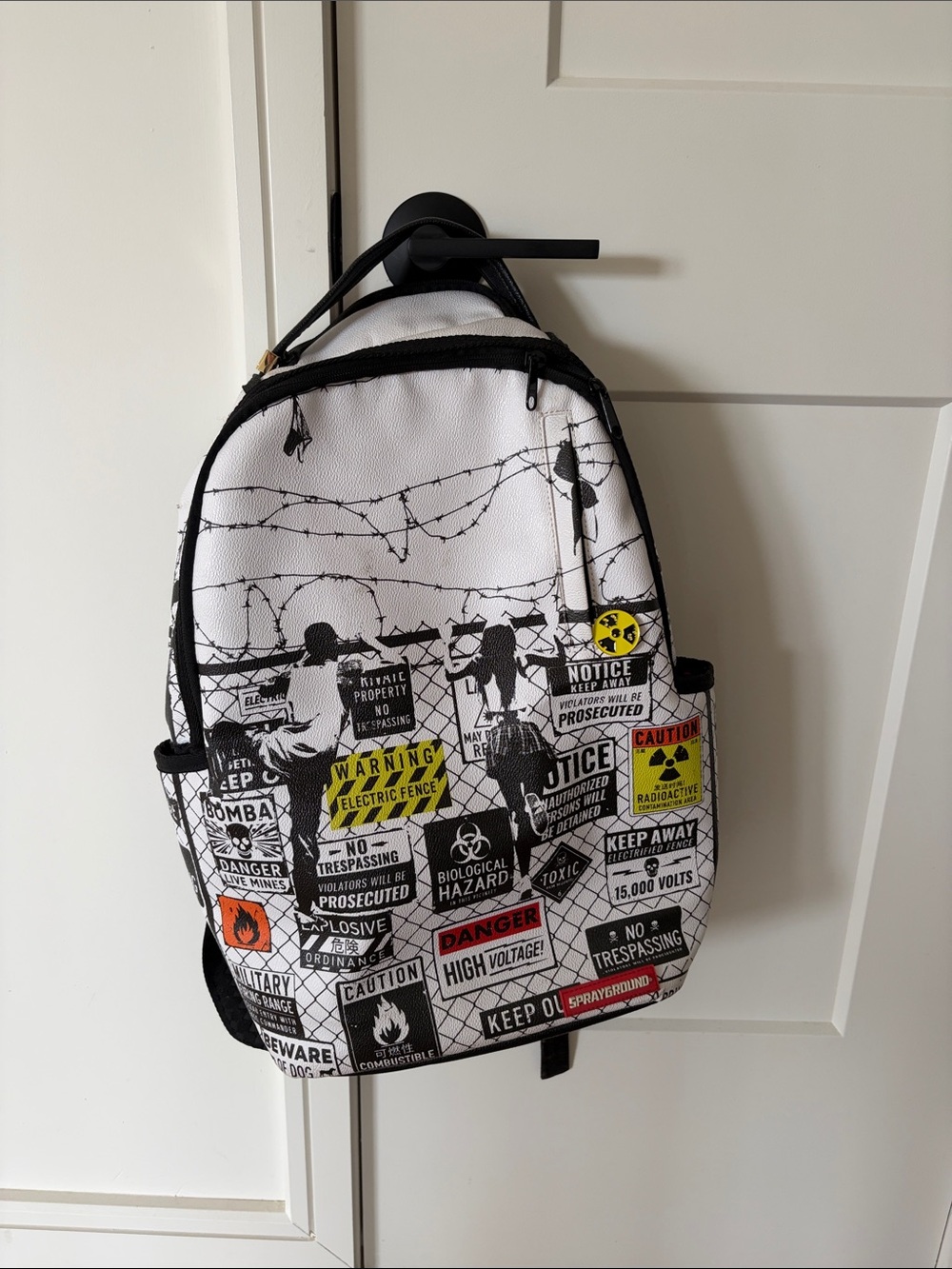 Sprayground White and Black Warning Graphic Kids Backpack
